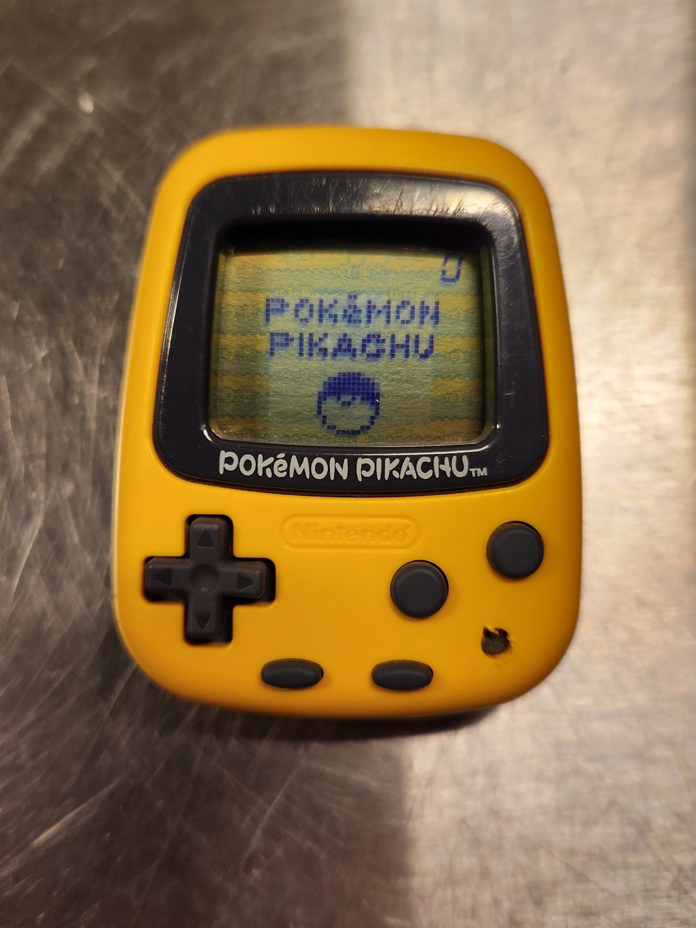 Vintage Nintendo Pokémon Pikachu Yellow and Black Virtual Pet Handheld